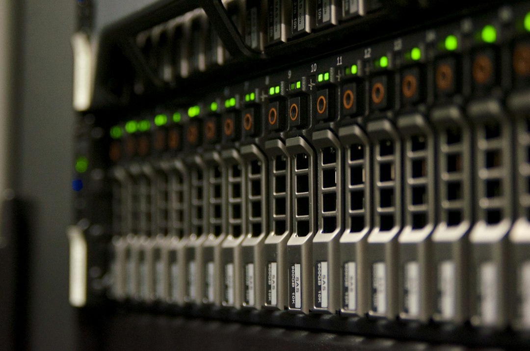 A modern server rack displaying green blinking indicator lights